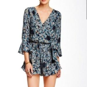 Free People all the right ruffles faux wrap long sleeve blue short romper Small